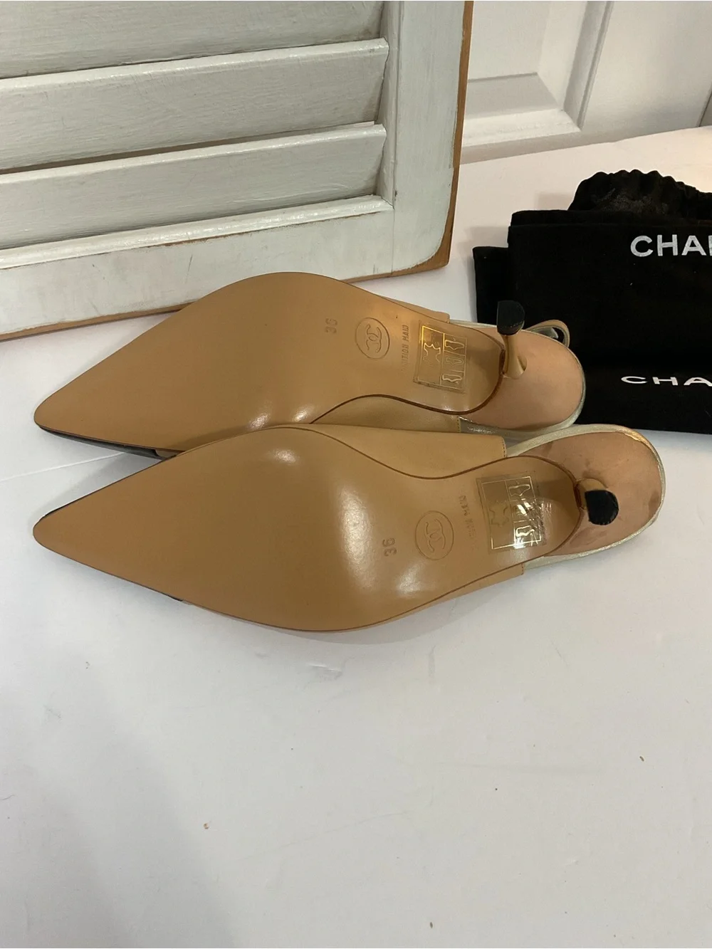 CHANEL Beige and Black Pointed Slingback Pumps